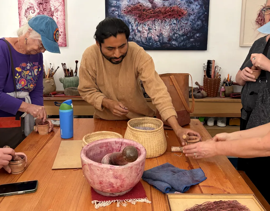 Learning about the cochineal bug with Oaxacan artist Edgar Jahir Trujillo during the Oaxaca Art Retreat.